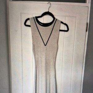 Sleeveless Cream Dress with Black Trim